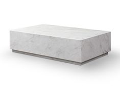 a white marble box sitting on top of a table