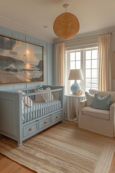 a baby's room with a crib, chair and painting on the wall