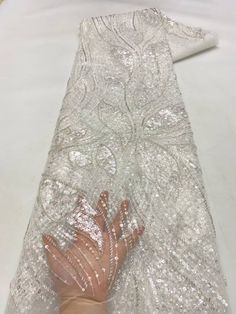 This high quality Fabric is measured in 5 Yards With Embroidered Beading and Sequin. It is soft, very delicate and beautiful. This high Quality Fabric is made with Fashion embroidered rhinestones can be used in making party wedding dresses, skirts, shawls, scarves and other other fashion apparels as you would like. Size : Length : 5 yards (180 inch). Width: 50 inch (Please allow slight deviation for the measurement data ,±1 inch) Material: 100% Polyester, Tulle Lace Fabric, Eco-Friendly embroide Color Durazno, Strung Beads, African Lace, Handmade Fabric, Tulle Lace, Fabric Shop, Wedding Party Dresses, Fashion Fabric, Toscana