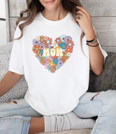 Mom Shirt, Mom Floral Boho T shirt, Mom Oversized Crewneck Shirt, Mothers Day shirt, Mother's Day Gift, Mom Birthday Gift Welcome to my store! Our shirts are designed to add joy and color to your life. Feel free to ask me anything you may need help with, I'm happy to assist you in any way. *please note, there may be changes in the color shade depending on the screen on which the item is viewed. .: Comfort Colors 1717 tee is made with medium fabric (6.1 oz/yd² (206.8 g/m consisting of high qualit Multicolor T-shirt For Mother's Day Gift, White T-shirt For Mother's Day Gift, White Tops With Funny Print For Gift, Casual Oversized Tops For Mother's Day, Printed Relaxed Fit Tops As Gifts, Relaxed Fit Printed Tops As Gifts, Printed Relaxed Fit Tops For Gifts, Funny Print Crew Neck Top For Mother's Day, Printed Tops With Relaxed Fit As Gift