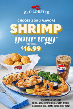 shrimp and other seafood items on a table with red lobster coupon advertise