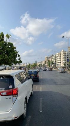 cars are parked on the side of the road