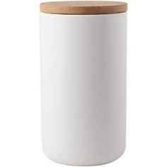 a white canister with a cork lid and wooden top on a white background photo