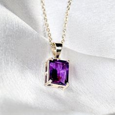 Natural Amethyst Square Shape Women's Pendant With Silver Chain/Beautiful Gift For Wife Necklace/Gift for Pendant/Purple Stone Necklace. "At the heart of this pendant lies a captivating amethyst Square Shape cut stone, chosen for its exceptional clarity and brilliance. Each stone is carefully selected to ensure that it radiates a luminous glow, captivating the eye and capturing the imagination. Crafted with meticulous attention to detail, this pendant is housed within a sterling silver setting, providing a durable yet elegant foundation for the dazzling gemstone. The design is imbued with intricate detailing, adding depth and dimension to the piece and enhancing its regal charm. Whether worn as a statement piece for a special occasion or as an everyday accessory to elevate your ensemble, t Purple Clavicle Chain Pendant Necklace, Purple Necklace With Adjustable Chain For Gift, Elegant Purple Rectangular Necklace, Purple Jewelry With Adjustable Chain As Gift, Purple Jewelry With Adjustable Chain For Gift, Purple Rectangular Jewelry As A Gift, Purple Rectangular Jewelry For Gifts, Elegant Purple Necklace, Purple Rectangular Jewelry Gift