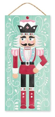 a wooden sign with an image of a nutcracker