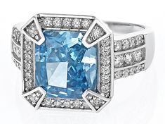 Bella Luce® blue and white diamond simulants 9.59ctw rectangular octagonal and round, rhodium over sterling silver Starry Cut ring. Measures approximately 0.81"L x 0.56"W and is not sizable. The diamond equivalent weight is 5.81ctw. Modern Asscher Cut Diamond Accent Jewelry, Modern Asscher Cut Diamond Accented Jewelry, Luxury Asscher Cut Blue Topaz Jewelry, Luxury Asscher-cut Jewelry With Accent Stones, Elegant Octagon Blue Topaz Jewelry, Platinum Octagon Jewelry With Center Stone, Elegant Blue Topaz Octagon Jewelry, Luxury Asscher Cut Jewelry With Accent Stones, Blue Octagon Rings With Diamond Accents