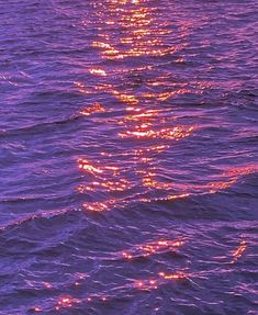 the sun shines brightly on the water as it reflects in the ocean waters surface