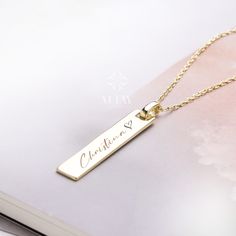 ABOUT PRODUCT  This 14K Gold Bar Necklace is suitable gift for girlfriend, mom and her. You can even buy as a birthday gift for your friends or anniversary gifts, If you want to add a special note we can write for you and put to inside of package.  We manufacture our jewelry pieces with carefully and after production we double checking in quality control department. Our main idea is keep our items for daily wearing especially for minimalist jewelry pieces. 14K Gold Bar Necklace, Custom Bar Neckl Rectangular Necklace For Mother's Day Gift, Engraved Rectangular Necklace For Mom, Rectangular Engraved Jewelry For Birthday Gift, Engraved Rectangular Jewelry For Birthday Gift, Personalized Silver Bar Necklace As A Gift, Personalized Gold Bar Necklace Gift, Personalized Silver Bar Necklace For Gift, Gold Engraved Bar Necklace For Mother's Day, Engraved Gold Bar Necklace For Mother's Day