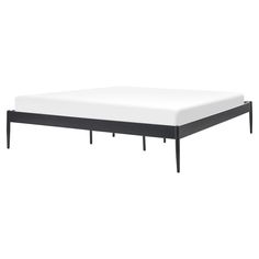 the bed frame is black and has white sheets