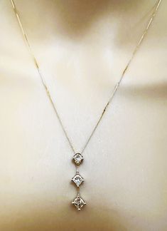 This is a beautiful classic necklace with 3 princess cut diamonds that graduate in size as they go down. The top diamond is 3.3 x 3.2 mm, the middle diamond is 3.8 x 3.7 and the bottom diamond is "4.0 x 3.9 mm and they total 1 carat. I cannot tell you the color or clarity since I am not a jeweler. But the diamonds sparkle and it's just a beautiful piece. The pendant itself is 1 inch long and it is stamped "14k" and a maker's mark "ZEI". It is on a 17.5 inches 14k gold chain that is stamped "14K" and a makers mark "RCI". The chain and pendant together weigh 2.74 grams. It is pre-owned and in excellent condition. Art Deco Pendant Necklace, Diamond Heart Pendant Necklace, Chevron Necklace, 14k Yellow Gold Necklace, Bar Pendant Necklace, Starfish Pendant, Classic Necklace, Celestial Jewelry, Heart Pendant Diamond