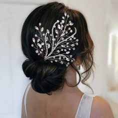 a woman wearing a bridal hair comb