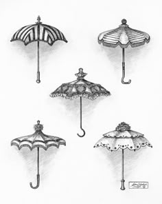 six umbrellas are shown in black and white