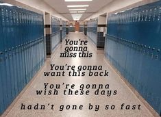 a hallway with blue lockers and a poem written on the floor that reads, you're going to miss this