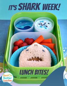 a lunch box with food in it and the words, it's shark week