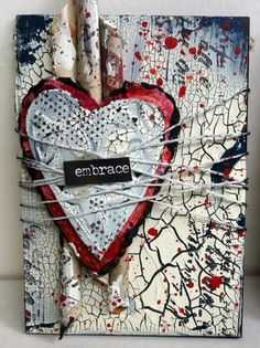 an altered piece of art with the word embrace written on it's front and side