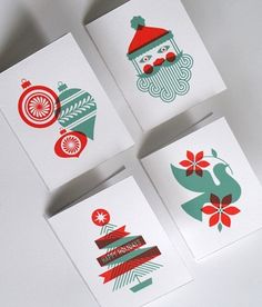 four christmas cards with designs on them sitting next to each other in front of a white background