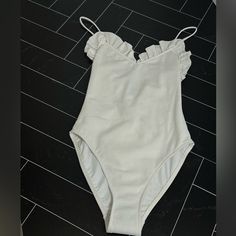 235 P74900v66375 1 Piece Swimming Suit Nn418 Ecru Elegant Pool Bodysuit For Spring, Elegant Bodysuit For Pool And Spring Season, Elegant Spring Bodysuit For Pool, Elegant Spring Poolside Bodysuit, Chic White Bodysuit For Pool, Chic White Bodysuit For The Pool, Elegant Cream Swimwear For Spring, Elegant White Bodysuit For Vacation, Chic White One Piece For Poolside