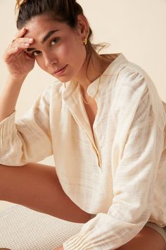 A feminine and flowy oversized blouse made from 100% cotton with subtle jacquard texture. Super soft and versatile. 100% Cotton.Delicate Wash or Dry CleanMade in PortugalAvailable in One SizeComfortably fits XS-LLength 53”Chest 17” Effortless Beige Blouse For Daywear, Oversized Cream Blouse For Daywear, Neutral Blouse With Relaxed Fit For Daywear, Neutral Relaxed Fit Blouse For Daywear, Feminine Neutral Long Sleeve Tops, Relaxed Long Sleeve Daywear Blouse, Relaxed Long Sleeve Blouse For Daywear, Relaxed Fit Blouse With Unlined Sleeves For Daywear, Neutral Relaxed Fit Long Sleeve Blouse