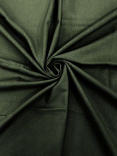 the fabric is very dark green in color