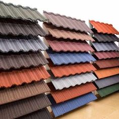 several rows of different colored roof tiles