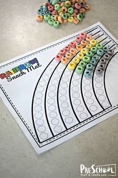 a printable rainbow snack mix game on a table