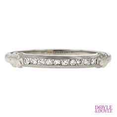 a white gold wedding band with diamonds