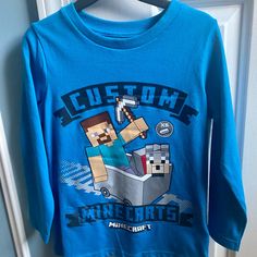 Brand New Long Sleeve Minecraft Shirt. No Marks Or Tears. Blue Long Sleeve Shirt For Playtime, Fun Blue Long Sleeve T-shirt, Playful Long Sleeve Blue T-shirt, Minecraft Shirt, Minecraft Shirts, Animal Graphic Tee, Long Sleeve Tee Shirts, Boys Long Sleeve, Marks And Spencer