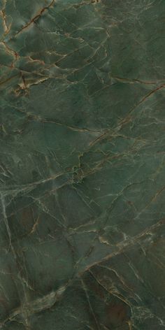 green marble textured with gold veining