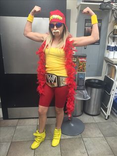 a woman dressed up as a wrestler posing for the camera