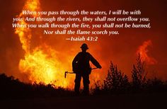 a firefighter standing in front of a blazing sky with a bible verse written on it