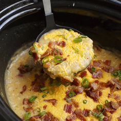 a crock pot filled with eggs and bacon