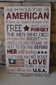 a wooden sign that says and i am proud to be an american where at least one won't free the men who died