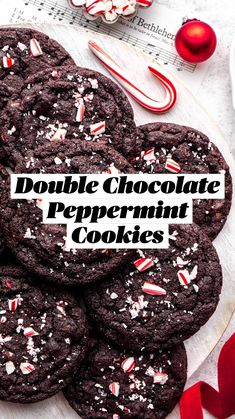 chocolate peppermint cookies on a plate with candy canes