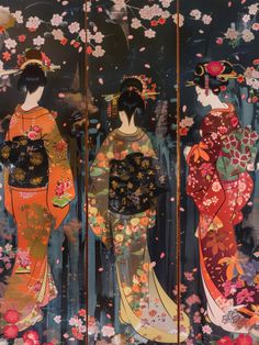 two geisha women standing in front of a screen with flowers and leaves on it