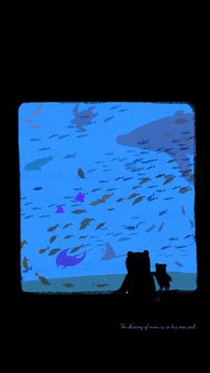 two people sitting in front of a large screen with fish swimming over them at night