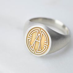 A classic solid sterling silver signet ring engraved with an oval medallion initial monogram which can be highlighted in gold. This classic solid sterling silver signet makes a fabulous, special gift for a man. Please see product images for each initial. The ring is softly rounded on the inside and outside - this shape offers a comfortable fit on the finger. A perfect gift for a loved one, a special birthday gift perhaps for an 18th or 21st. This also makes a wonderful gift for the man in your l Male Rings, Custom Handwriting Jewelry, Engraved Bangle, Engraved Cufflinks, Rings Women, Signet Rings, Initial Monogram, Silver Signet Ring, Gold Monogram