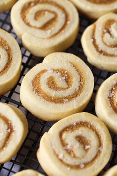 cinnamon rolls on a cooling rack ready to be baked