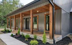 a house that is made out of metal and wood