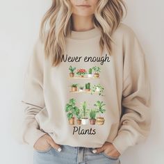 This never enough plants sweatshirt is the perfect cozy gift for plant lovers. It provides a comfy wearing experience with a clean-cut style, suitable for colder months. Ideal for those who love plants and want to stay warm and stylish. Product features - Knit in one piece without side seams for reduced fabric waste - Ribbed knit collar for elasticity and shape retention - Made with a medium-heavy fabric blend of 50% cotton and 50% polyester - Classic fit with crew neckline for a comfy wearing e Garden Lover Gifts, Fabric Waste, Cozy Gift, Never Enough, Plant Mom, Plant Lady, Green Thumb, Cut And Style, Nature Inspired