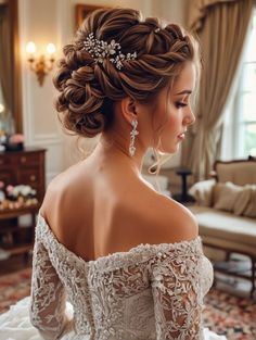 a woman in a wedding dress is looking off to the side with her hair pulled back