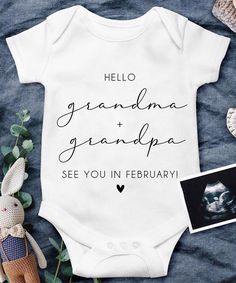 a baby bodysuit that says hello grandma and grandpa see you in february on it