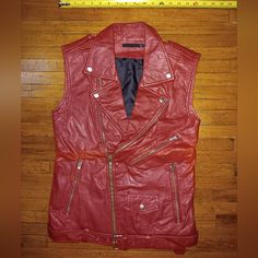 Red Leather Vest Size Small Red Leather Outerwear For Streetwear, Red Leather Biker Jacket For Streetwear, Red Leather Outerwear With Pockets, Red Fitted Leather Jacket With Pockets, Fitted Red Leather Jacket With Pockets, Edgy Red Leather Outerwear, Red Leather Vest, Leather Vest, Red Leather