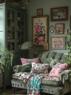 a living room filled with lots of furniture and flowers on the wall above it's windows