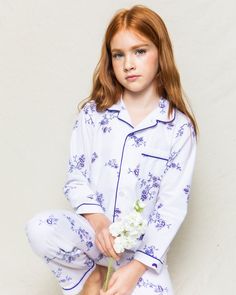 This delicate, vintage print evokes memories of spring mornings and the flowers climbing up the arbors. This classic pajama set is accented with navy piping and finished with pearl buttons. The sleepwear is made from the finest quality cotton and blended with just enough inherently flame retardant fiber to allow it to pass strict CPSC flame retardant laws without using harmful chemicals. The fabric is brushed for added softness, making the sleepwear feel absolutely luxurious, getting cozier afte Classic Cotton Sleepwear For Spring, Classic Sleepwear For Pajama Party In Spring, White Classic Sleepwear For Spring, Classic Spring Sleepwear For Bedtime, Classic Spring Sleepwear With Relaxed Fit, Classic Long Sleeve Sleepwear For Spring, Floral Pajama Set, Indigo Floral, Classic Pajamas