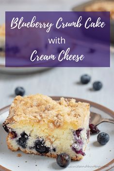 blueberry crumb cake with cream cheese on a plate