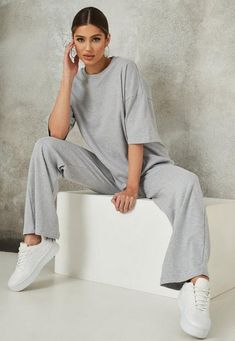 a wide leg trouser and oversized t shirt set in a rib texture.    regular fit     Top: Long Length - Covers the bum Bottoms: Wide leg with flats - Sits on the top of the foot    85% Cotton 10% Polyester 5% Elastane    Belle wears a UK size 8 / EU size 36 / US size 4 and her height is 5'8" Online Fashion Store, Co Ord Set, Oversized T Shirt, Online Fashion Stores, Co Ord, Online Clothing Stores, Clothes Online, Long Length, Wide Leg Trousers