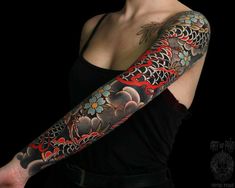 a woman with a tattoo on her arm