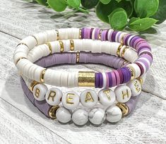 Heishi Bracelet Ocean, Male Clay Bead Bracelet, Clay Bead Bracelet Ideas For Christians, Purple Heishi Bracelet Ideas, Pretty Clay Bead Bracelets, Heishi Bracelet Patterns, Purple Heishi Bracelet, Stacked Bracelet Ideas, Disk Bracelet Ideas