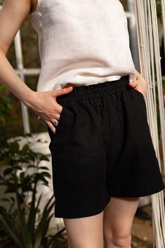 Black Linen & cotton shorts with pockets, high waisted womens linen shorts, Farmhouse cotton shorts Perfect summer shorts for any woman!  Our women's summer linen & cotton shorts are made of soft natural fabric that is comfortable and breathable.  Material: Linen 52% Cotton 48% Available in sizes XS to L The elastic waistband ensures a perfect fit, and the casual model creates a stylish image.  The shorts have two pockets, ideal for carrying small items or just giving extra style.  The fabric is light and airy, which makes them ideal for wearing on hot summer days on the beach or on business in the city.  They can also be combined with a T-shirt to create a fashionable version of an office suit. With these shorts, you can create the perfect look for every day!  High-quality materials and c Womens Linen Shorts, Linen Shorts Women, Summer Linen, Natural Fabric, Soft Natural, Black Linen, Linen Shorts, Skorts, Natural Fabrics