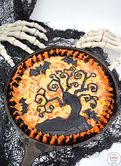 a halloween cake decorated to look like a tree